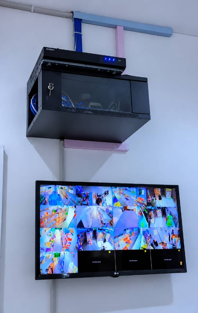 Complete CCTV surveillance installation for a supermarket in Lagos, Nigeria, featuring Hikvision high definition security cameras and a 360 degree PTZ control camera for full area monitoring. This intelligent security system provides crystal clear video coverage, remote viewing, and enhanced protection for customers, staff, inventory, and business operations around the clock.