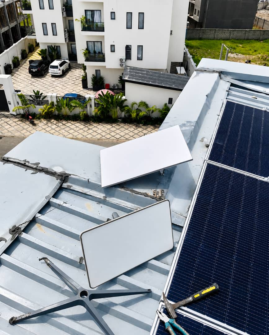 Successful upgrade from Starlink Gen 2 to the latest Starlink Gen 3 dish at a residential property in Jahi, Abuja. The new Gen 3 hardware delivers improved performance, a slimmer profile, and better reliability. installed on the rooftop alongside an existing solar panel array we integrated before for a fully integrated power and connectivity setup. — image 1